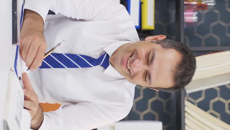 Vertical-video-of-Cheerful-businessman-laughing-playfully.